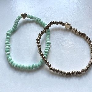 2 stretchy brackets, blue and gold with a heart.